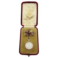 Swiss 14ct gold open face keyless cylinder ladies fob watch, white enamel dial with Roman numerals, guilloche red enamel decorated with Fleur de Lys and split seed pearl surround, case No. 285674 with Swiss export hallmarks and engraved horse, with German silver red enamel and split pearl bow attachment stamped 800, in personalised silk lined case by J.C Vickery, Regent street