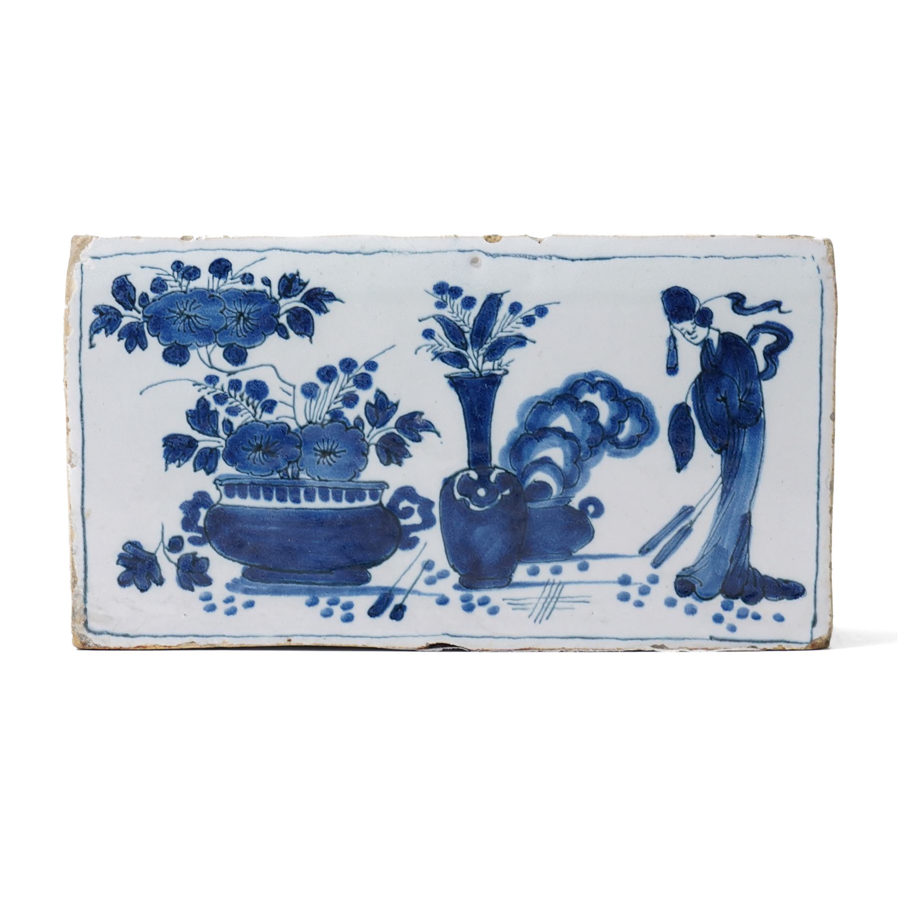 18th century English Delft flower brick, painted with a Chinese figure stood beside antiques, W16.5cm