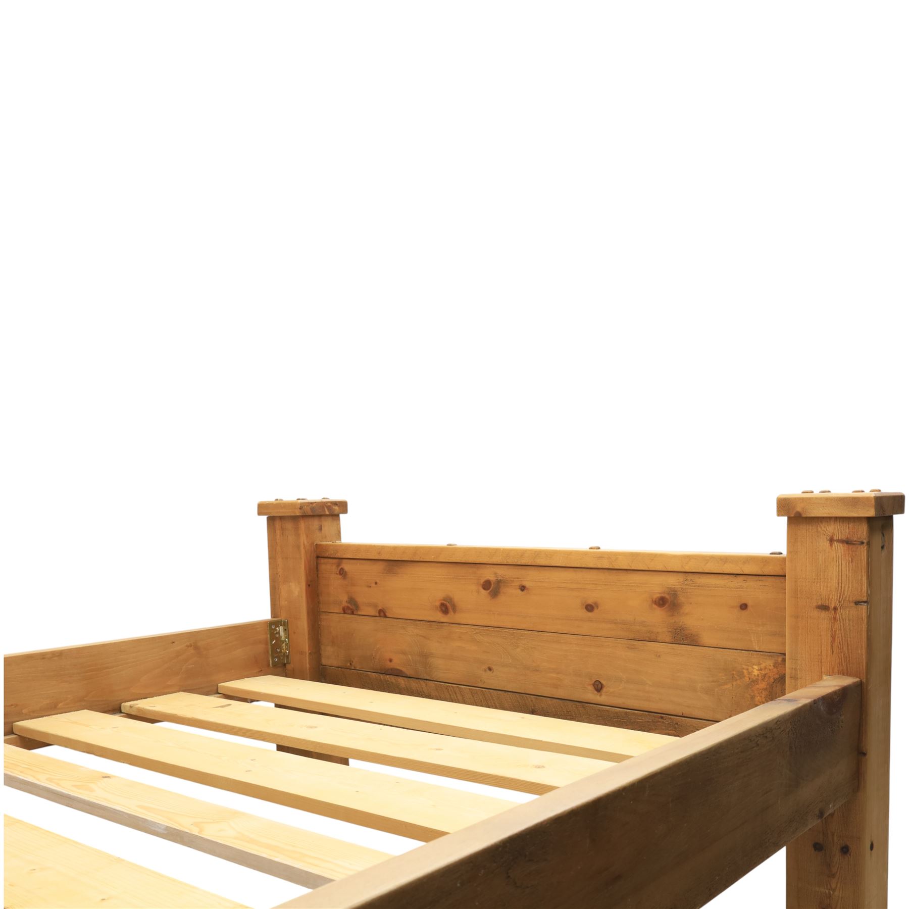 Alexander Ellis of Beverley - rustic pine king sized bed, of plank form construction with visible dowels, raised on stile supports