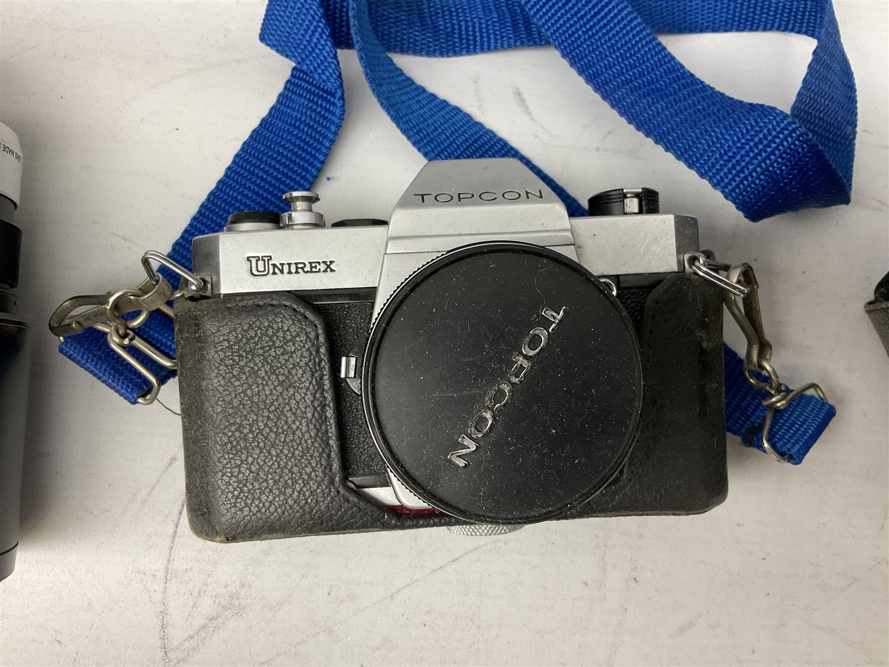 Quantity of cameras and lenses to include Topcon Unirex camera etc with cases