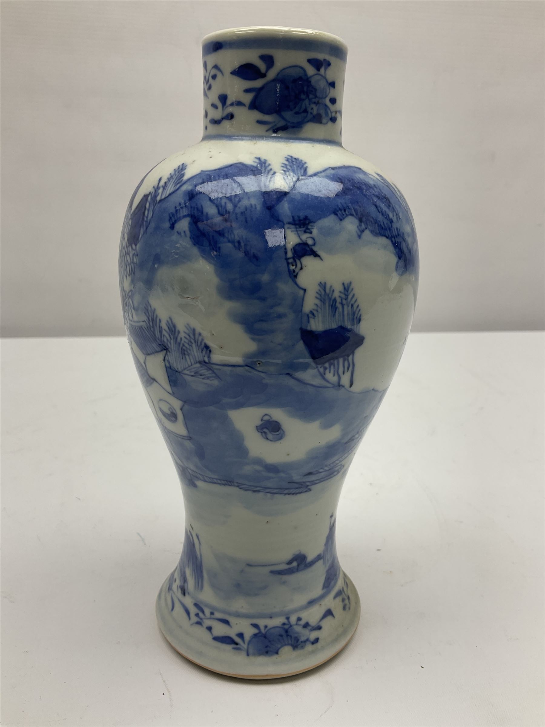19th century Chinese Kangxi style blue and white jar and cover, decorated with figural and landscape scenes, the domed cover with foo dog finial, with four character marks beneath, H22cm