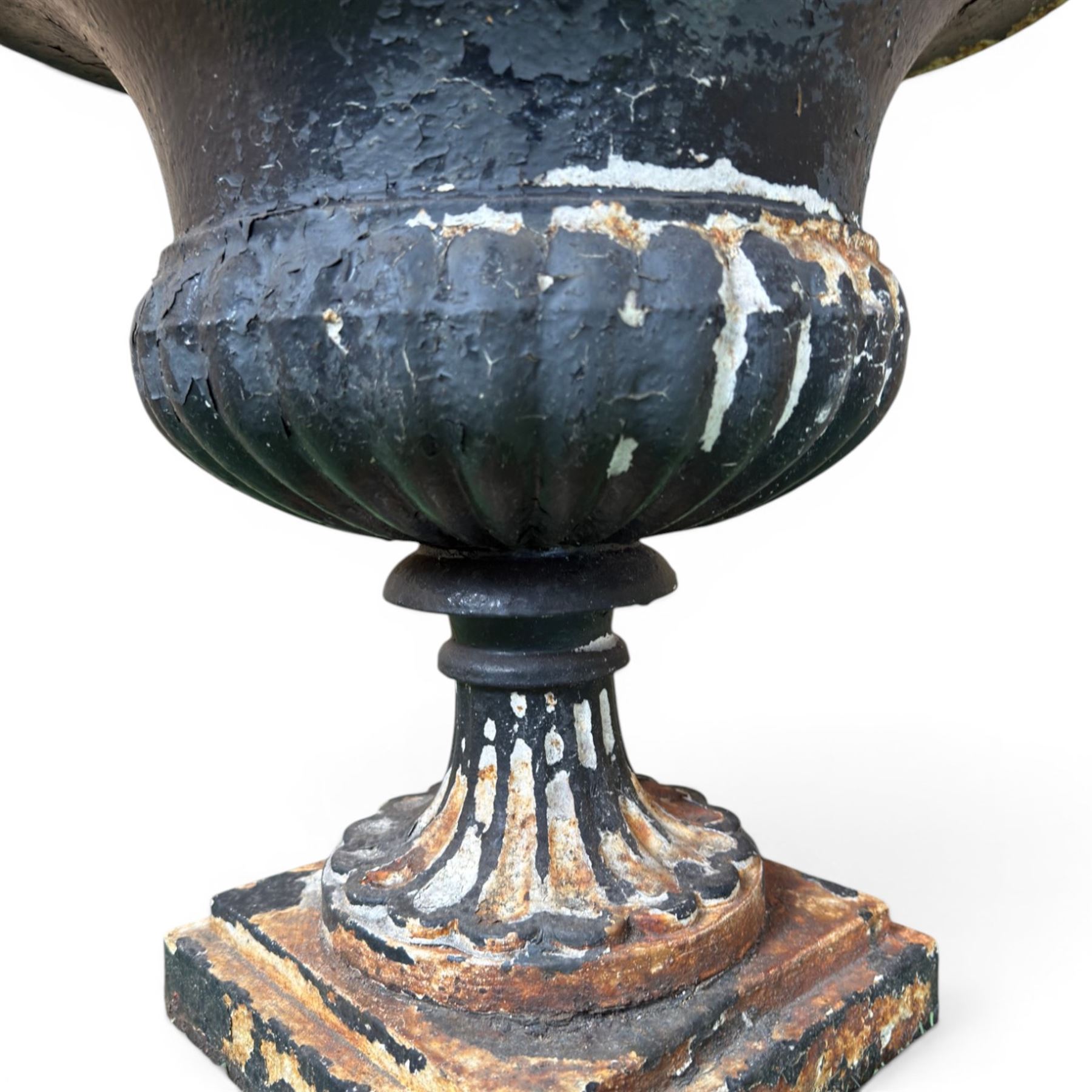Circle of Coalbrookdale - 19th century cast iron and black painted campana shape urn with flared and scalloped rim, gadrooned underbelly on stepped square base