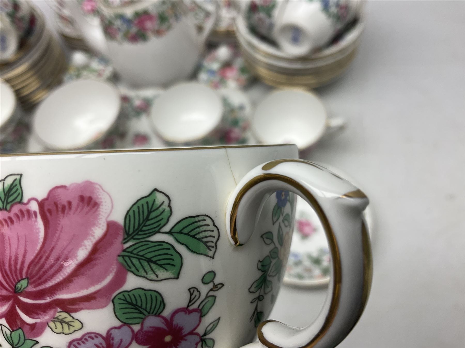 Crown Staffordshire Thousand Flowers pattern part tea service, to include teapot, two open sucriers, eighteen cups, fifteen saucers etc (57)