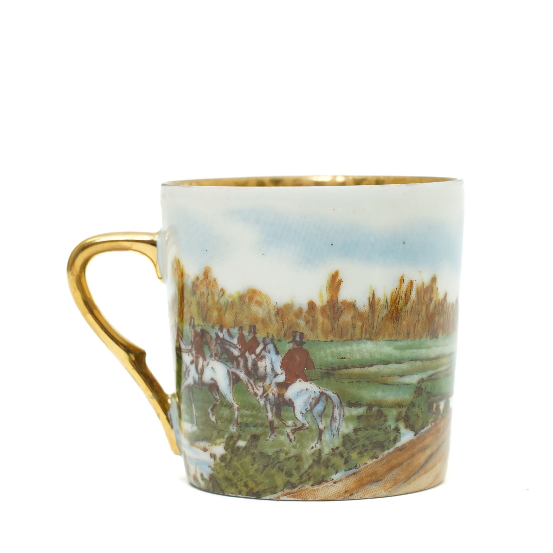 Limoges  coffee set decorated with hunting scenes within a gilt border comprising twelve cups and saucers, coffee pot, cream jug and sugar bowl
