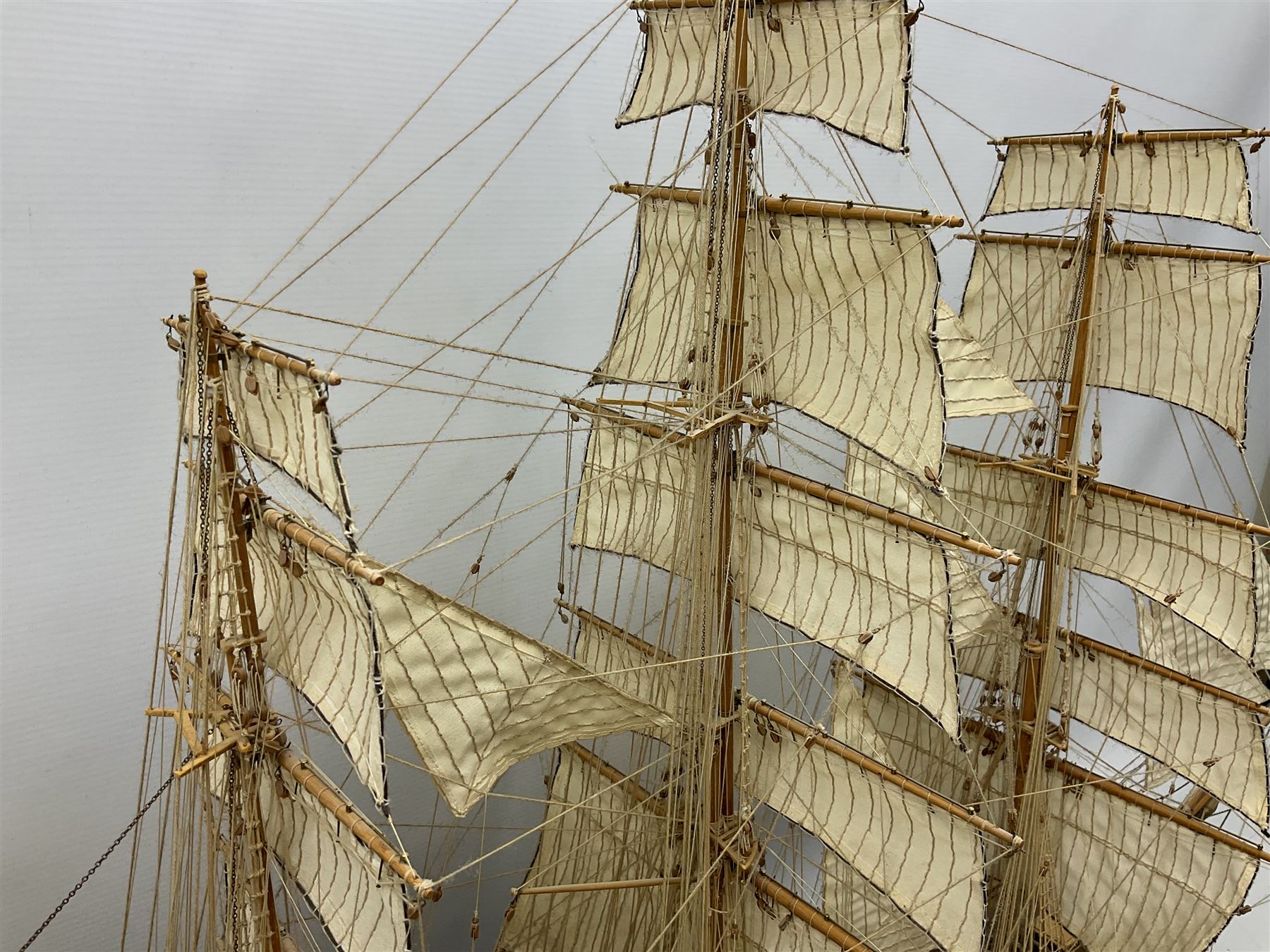 Three masted kit built sailing ship with cloth sales, deck fittings and full rigging, on open display, L110cm, H80cm  