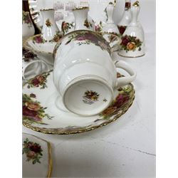 Royal Albert Old Country Roses pattern ceramics, to include table lamp, lidded vase, two pairs of salt and pepper shakers, cups and saucers, plates, biscuit jar, bowls, lidded preserve pot, vases, dishes, knives, napkin rings, lidded jars and box, pair of candlesticks etc