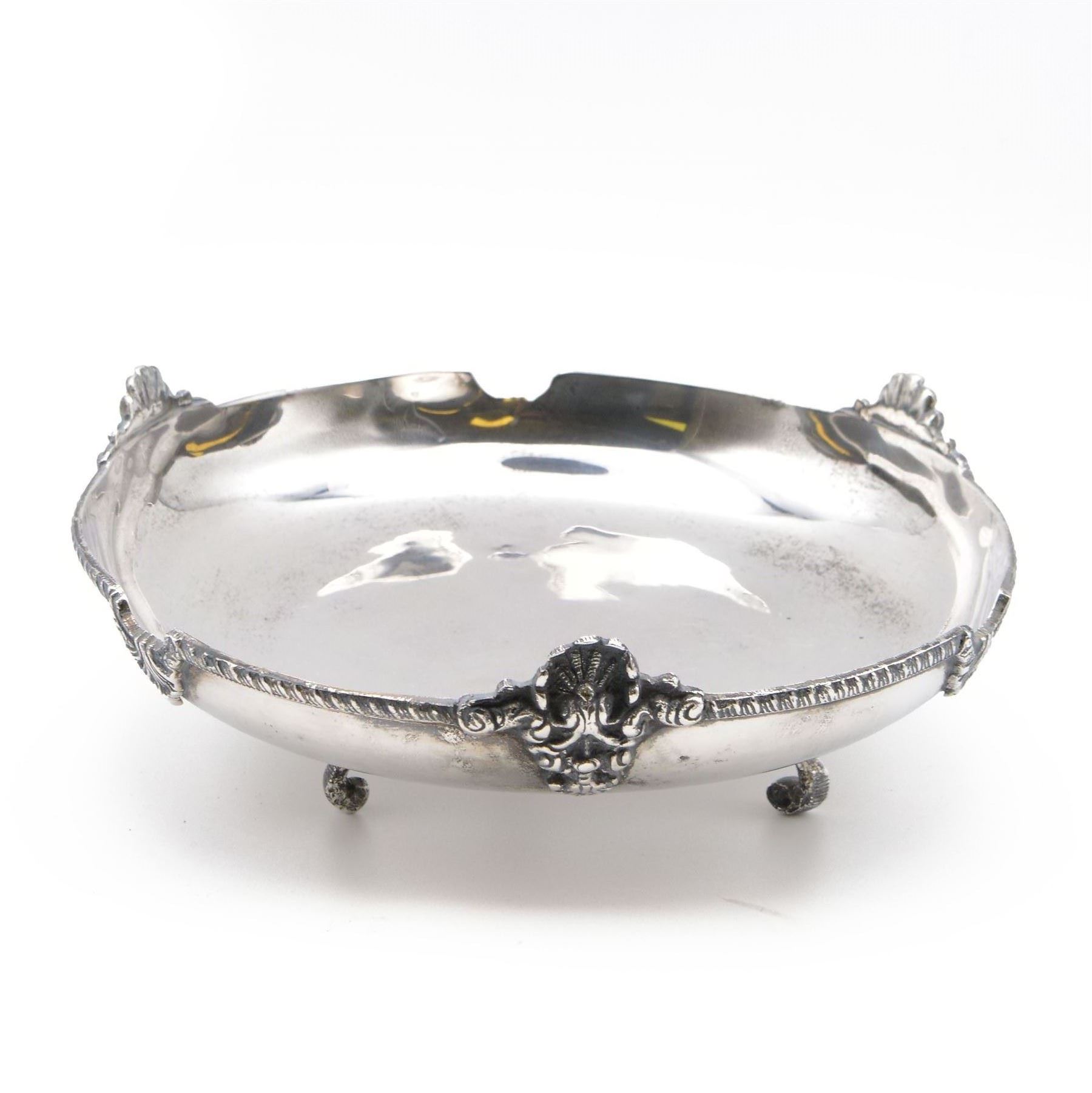 Egyptian silver bowl, of circular form, with oblique gadrooned rim and cast palmette decoration, upon three scroll feet, marked for 900 fineness, D20cm