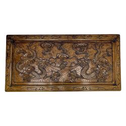 Chinese camphorwood blanket chest with stylized dragon carved decorated lid
