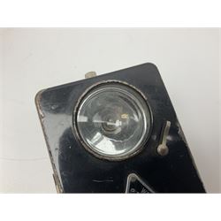 Police - Victorian turned hardwood truncheon with traces of decoration and VR cypher L42cm; Humberside Police helmet with Queens Crown helmet plate; hand lamp inscribed 'The Inspector'; and small pair of pewter figures of police officers (5)