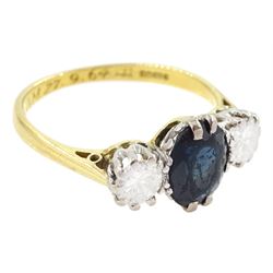 18ct gold sapphire and diamond three stone ring, single oval cut sapphire, with two round brilliant cut diamonds set either side, Sheffield 1987, total diamond weight approx 0.60 carat
