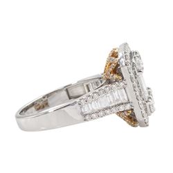18ct white and rose gold baguette and round brilliant cut diamond cluster ring, with diamond set shoulders, stamped 750, total diamond weight approx 2.75 carat, with World Gemological Institute report