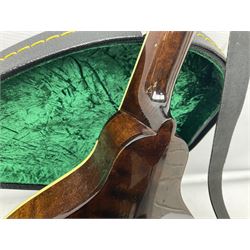 Eastman eight-string mandolin model MD504, serial no.140435406, L66cm; in TGI hard carrying case; together with case of instructional CDs