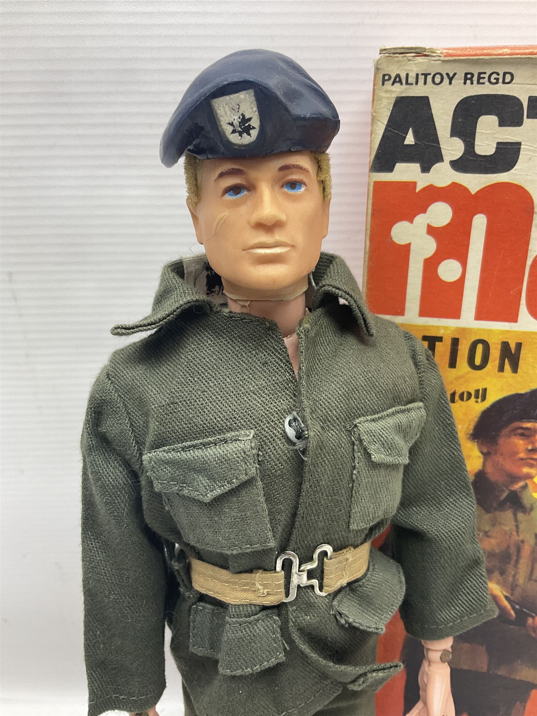 Palitoy Action Man Action Soldier No.34014 with tunic, belt, trousers, boots, blue beret and sten gun; in original box; and Palitoy Action Man Royal Military Policeman (RMP) gripping hands figure, marked 'Made in England by Palitoy under licence from Hasbro © 1964' to rear of torso; with tunic, shirt, trousers, tie, boots, belt, truncheon, pistol in holster, MP armband, red cap, Sterling machine gun and other clothing etc; in anrelated display box (2)