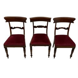 Seven early 19th century mahogany dining chairs - set six side chairs with scroll carved middle rails (W46cm), and a carver elbow chair with rope twist middle rail