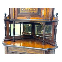 Late 19th century inlaid rosewood free standing corner display cabinet, the upper section featuring a mirrored panel above an inlaid cupboard with a felt-lined interior, complemented by a recessed open compartment with a mirrored back, the base with a glazed door enclosing two felt-lined shelves, on turned supports