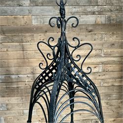 Pair of black finish wrought metal hanging baskets, with brackets