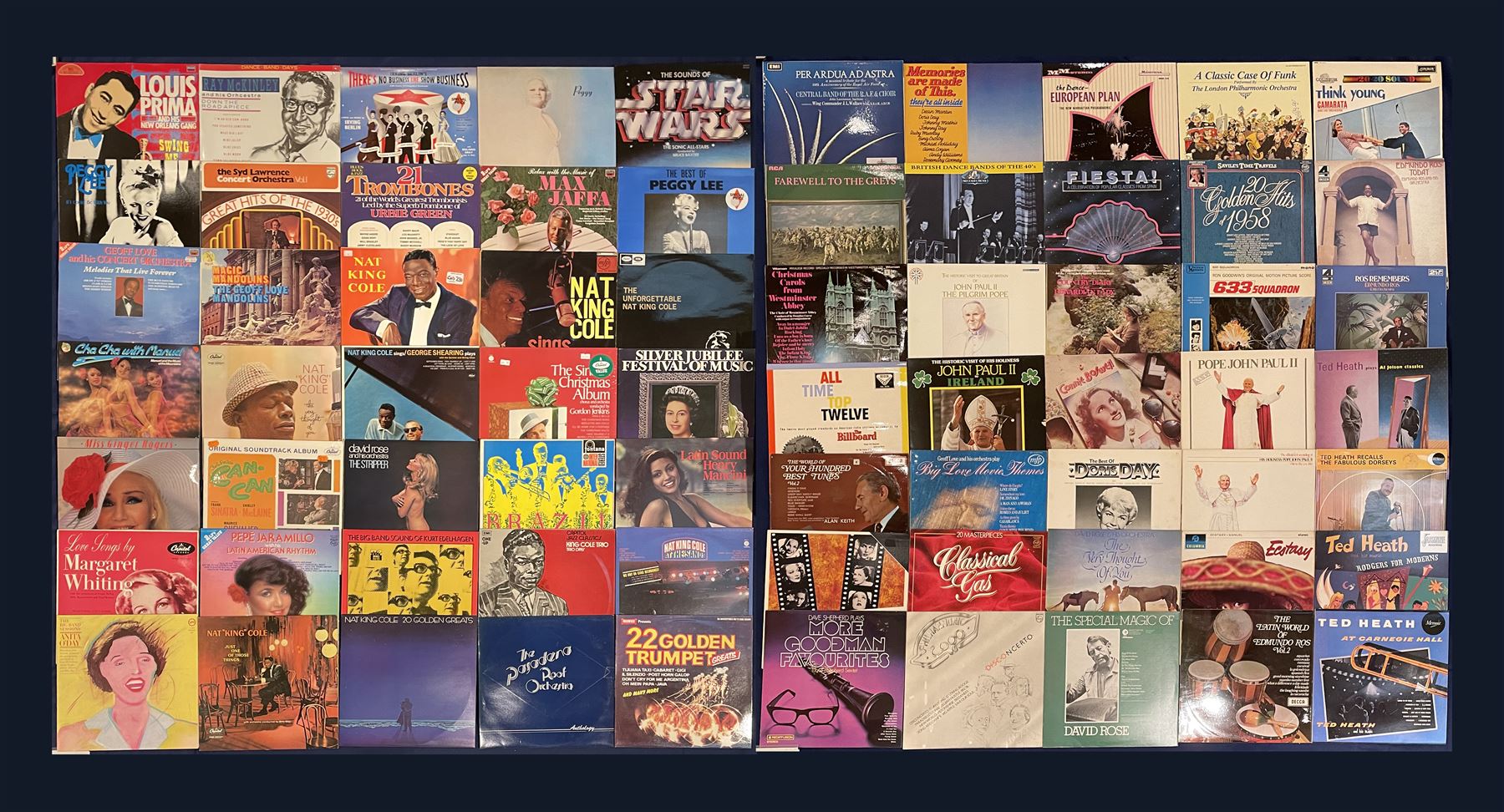 Large quantity of vinyl records including 'Nat King Cole Melody Mile', various other Nat King Cole, 'Magic Mandolins The Geoff Love Mandolins', 'The Best Of Peggy Lee' etc; 'Bing Crosby A Christmas Toast', 'At the Jazz Band Ball with Eddie Condon and his Orchestra', 'Anne Shelton I'll Be Seeing You' etc,  'The Very Best of Nat King Cole', 'Isn't it Heavenly Joe Loss and his Band 1933-1934', 'Sentimentally Yours Al Bowlly', 'Johnny Mercer Sings Johnny Mercer', 'Billy Cotton and his Band Somebody Stole My Gal' etc; 'Ray McKinley Class Of 49', 'The Boyd Raeburn Orchestra Experiments In Big Band Jazz 1945', 'The Golden Age Of Felix Mendelssohn's Hawaiian Serenaders', 'Scott Wood & His Six Swingers 1935:1936' etc, 'Van Phillips and His Band 1928-1934', 'Great British Dance Bands Play Jerome Kern 1926-46', 'The Golden Age of Noel Gay', 'Dancing The Night Away', 'Nat King Cole Thank You, Pretty Baby', 'Alice Faye In Hollywood (1934-1937)' etc,  'June Christy Recalls Those Kenton Day', 'Doris Day Whatever Will Be, Will Be', 'Keely Smith I wish you Love', 'Rosemary Clooney with orchestra arranged and conducted by Nelson Riddle', 'Zing! Ross Mitchell, His Band And Singers', 'The Glenn Miller Story' etc,  approximately 450