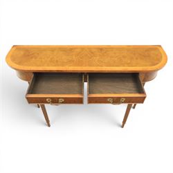 Traditional design walnut D-end hall table, figured top and sides, two frieze drawers with brass handles raised on fluted and turned supports