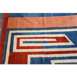 20th century Anatolian Turkish indigo ground rug with Art Deco inspired abstract design in tones of ivory, crimson and coral