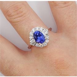 18ct white gold oval tanzanite, baguette and round brilliant cut diamond cluster ring, stamped 750, tanzanite approx 1.20 carat, total diamond weight approx 0.50 carat