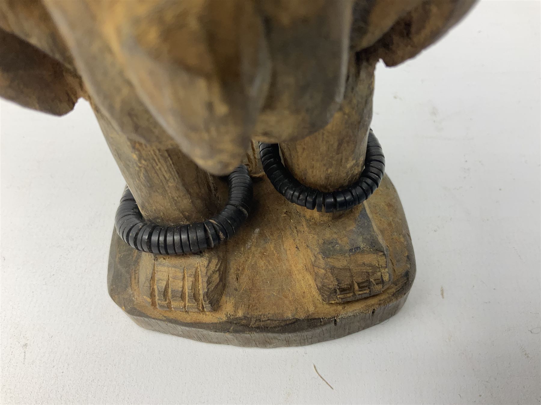 Early 20th century West African Yoruba family wooden figure of Orisha Oko, the god of farming/agriculture, carved from the solid, bears manuscript label of provenance verso H26.5cm