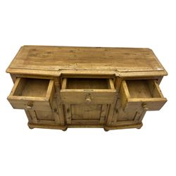 Stripped pine dresser, fitted with three drawers and three cupboards