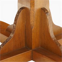 Gnomeman - adzed oak dodecagon dining table, the shaped top raised on a cruciform base with tooled brackets, terminating to four sledge feet, carved with gnome signature, by Thomas Whittaker, Littlebeck, Whitby