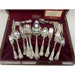 Silver handled Kings pattern bread knife, together with a canteen of silver plated Kings pattern cutlery by K Bright Ltd, in wooden fitted case, silver plated four piece tea service, toast rack, cruet set and pair of candlesticks