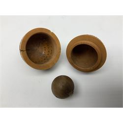 Three 19th century coquilla nut pomanders or flea catchers, each of egg shaped form with carved and pierced decoration and screw threaded join, largest example 6cm