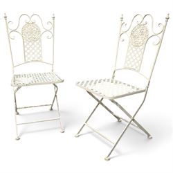 Pair of Victorian design wrought metal folding garden chairs, scrolled cresting rail over ...