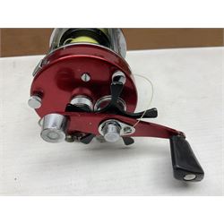 Four Abu fishing reels, comprising Ambassadeur 9000, Ambassadeur 7000, Ambassadeur 5500 and Ambassadeur 6500, together with additional line, hardy fishing bag and two wooden boxes