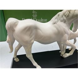 Five Beswick and Royal Doulton horse figures in matt white on black plinths, comprising of  Spirit of Affection no. 2689/2536, Springtime no.2837, Spirit of peace no.2916, Spirit of earth no.2914 and Spirit of the wild no. 183, together with a composite figure of a horse (6)