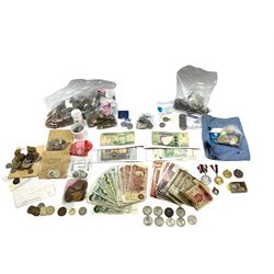 Great British and World coins including approximately 60 grams of pre 1920 and approximately 50 grams of pre 1947 silver coins, various denominations of pre-decimal coinage including half crowns, commemorative crowns etc, pre-euro currency from various countries such as French Francs, small number of modern usable USA coins etc, banknotes including Bank of England ten shillings and one pound notes, pre-euro notes etc, a small hallmarked silver fob and a few commemorative medallions, in one box