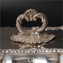 Pair 19th century silver plated entree dishes and covers with gadrooned and shell moulded borders and loop handles engraved with a crest and another similar