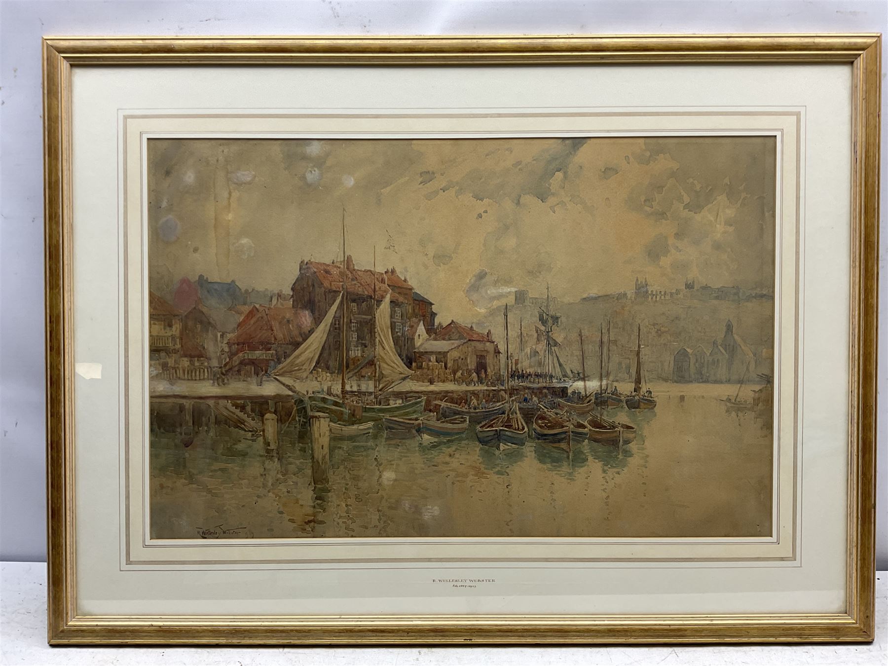 R Wellesley Webster (British exh.1887-1903): Dock End Whitby, watercolour signed and dated '99, 47cm x 73cm 
Notes: Webster is listed as living in Manchester 1887 and 1895, Anstruther 1894, and Southport 1899. He exhibited at the Manchester City Art Gallery 16 times, the Royal Academy 10 times, and once at the Royal Scottish Academy.