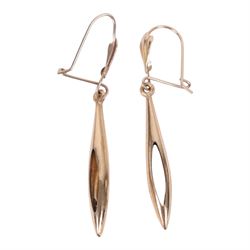 Eight pairs of 9ct gold earrings 