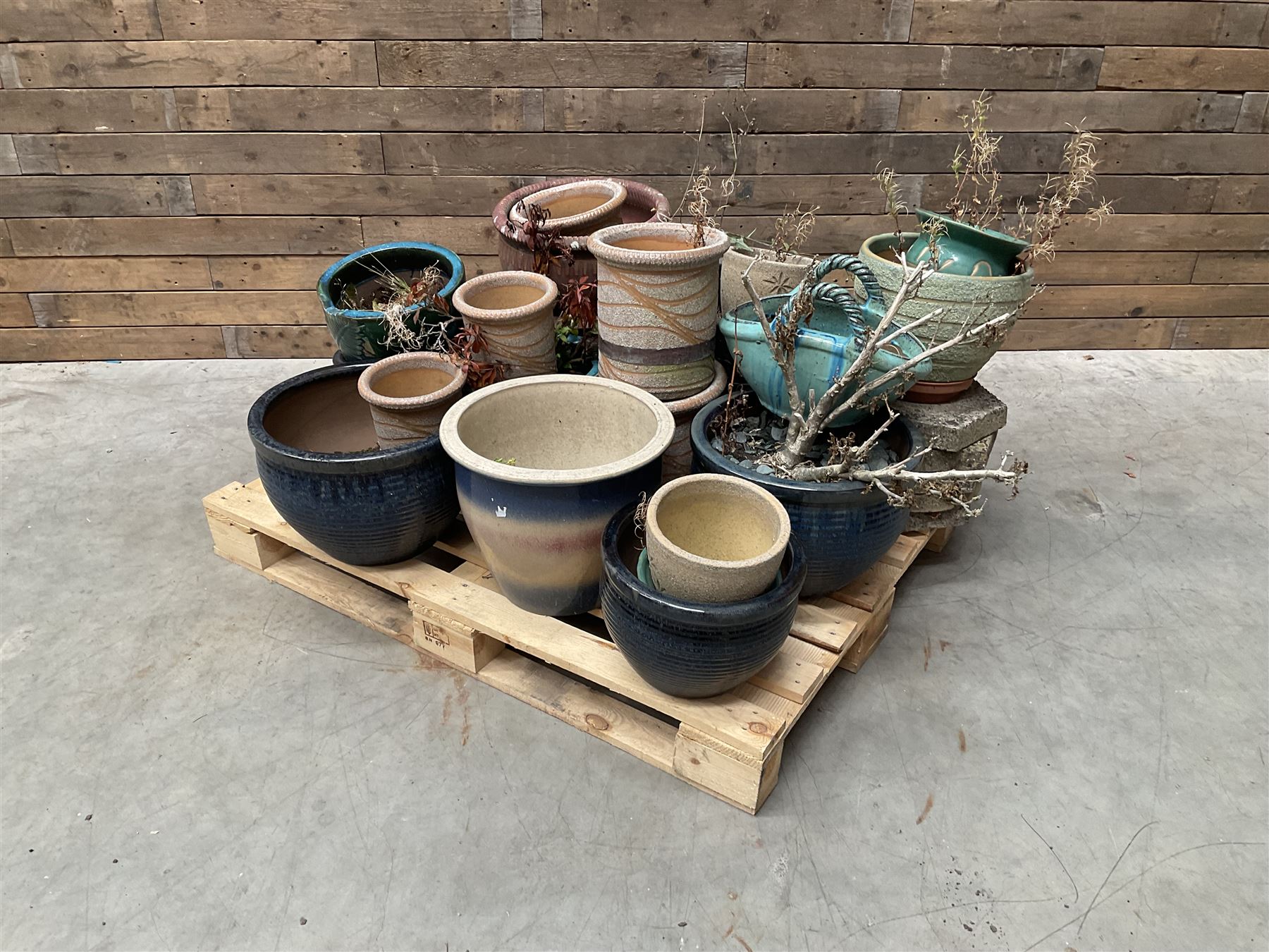 Large collection of ceramic plant pots and paving slabs, (26)