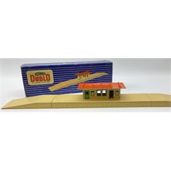 Hornby Dublo - wooden D1 Main Line Station and D1 Goods Depot, both in pale blue boxes; die-cast D1 Through Station in plain blue box; die-cast D1 Island Platform and D1 Signal Cabin, both in blue striped boxes (5)