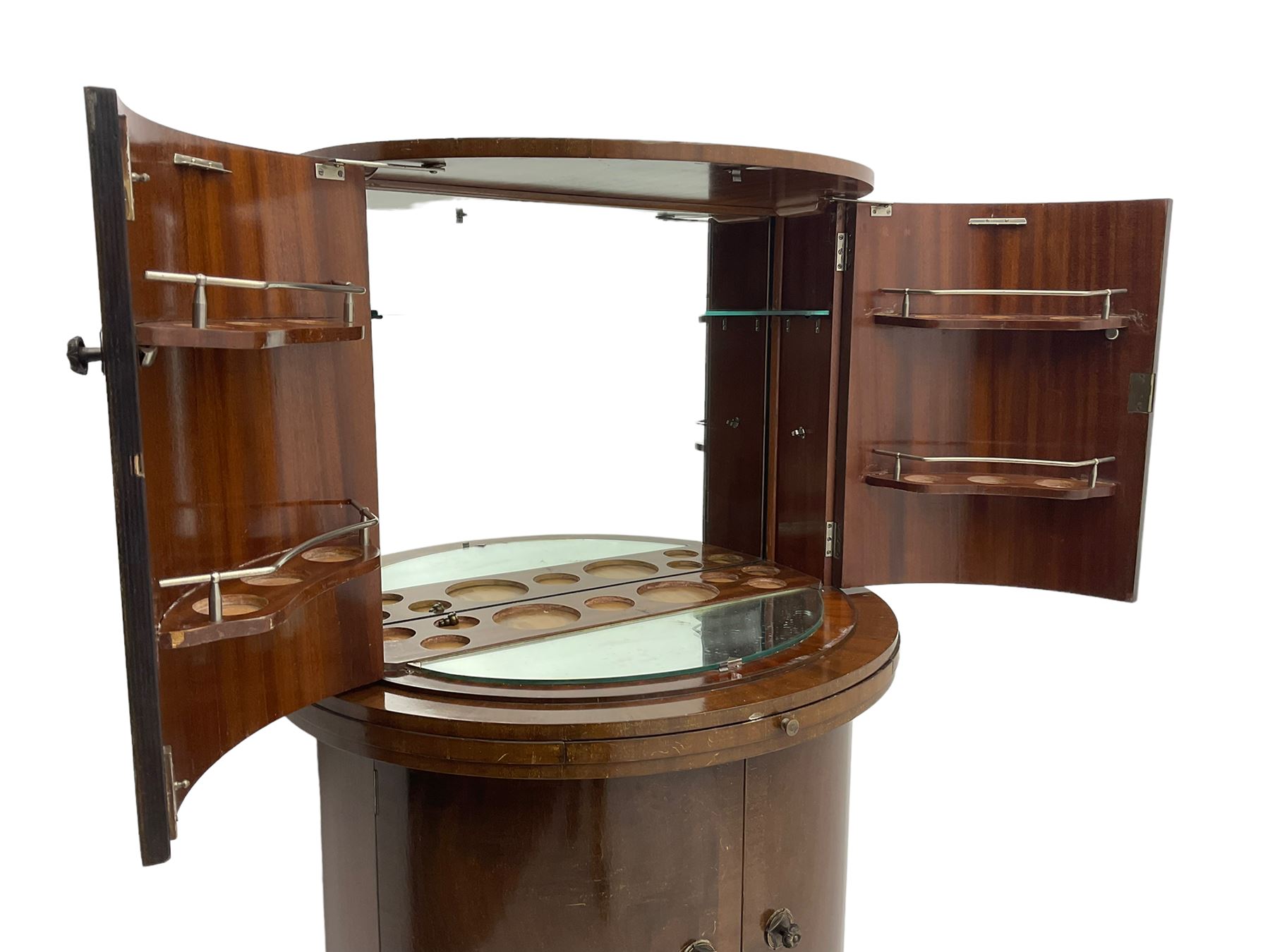 1930s Art Deco walnut demi-lune cocktail cabinet, enclosed by four curved doors, the upper section with mirrored interior, glass shelf and glass holders, the lower section fitted with shelves and bottle holders