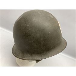 French Algerian War Red Cross steel helmet, marked 'CP ICA Esperaza 1955'; green finish with crudely painted Red Cross logo to the front