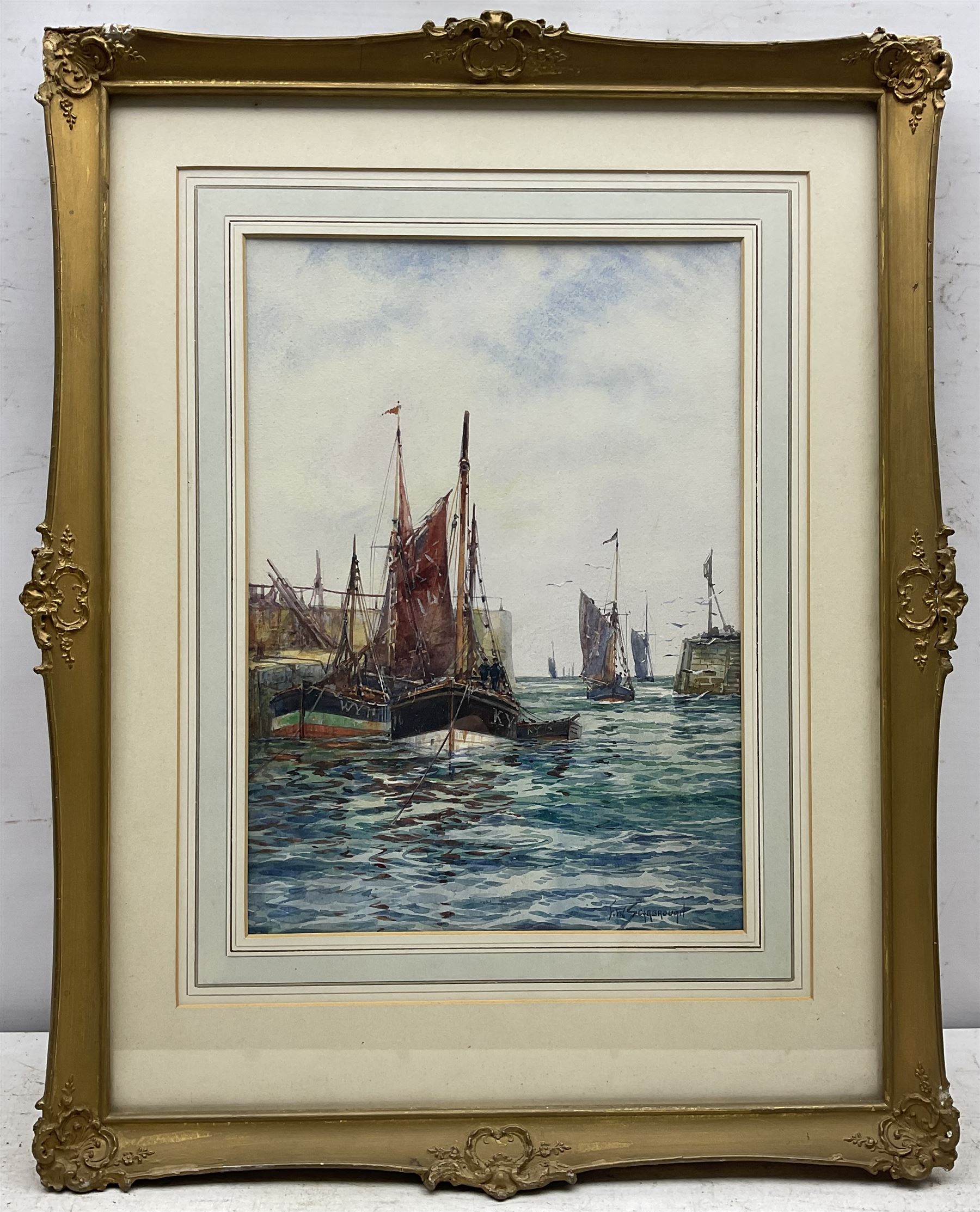 Frank (Frederick) William Scarborough (British 1860-1939): Whitby and Kirkcaldy boats in Harbour, watercolour signed 33.5cm x 24cm 
Provenance: with the Mangate Gallery London, label verso