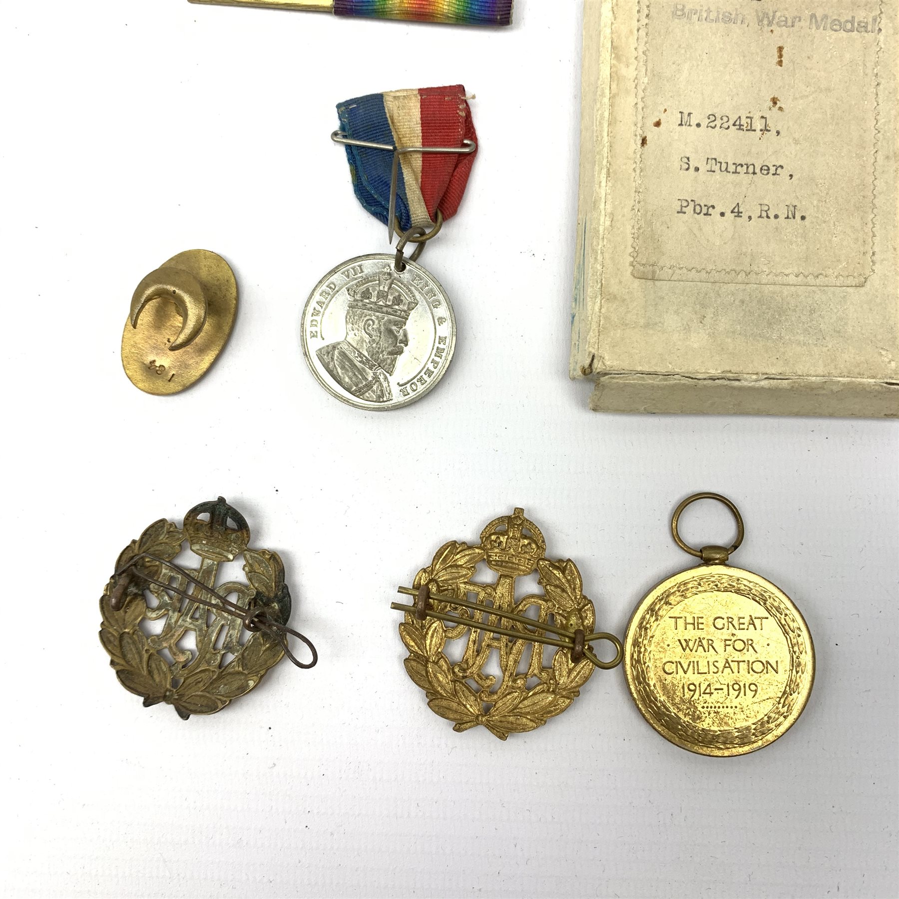 King George V 1914 - 1918 British War Medal named to '14-133 PTE J.W. ROBSON. E. YORK R', War Medal named to 'M. 22411 S. TURNER. PBR. 4 R.N.', Victory Medal and 1914-15 star both named to '3408 PTE. G. COLLINSON. W. YORK. R.' and various badges etc