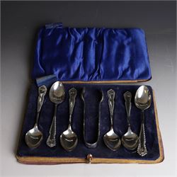 Set of six silver teaspoons and sugar tongs, with embossed foliate decoration, hallmarked I S Greenberg & Co, Birmingham probably 1917