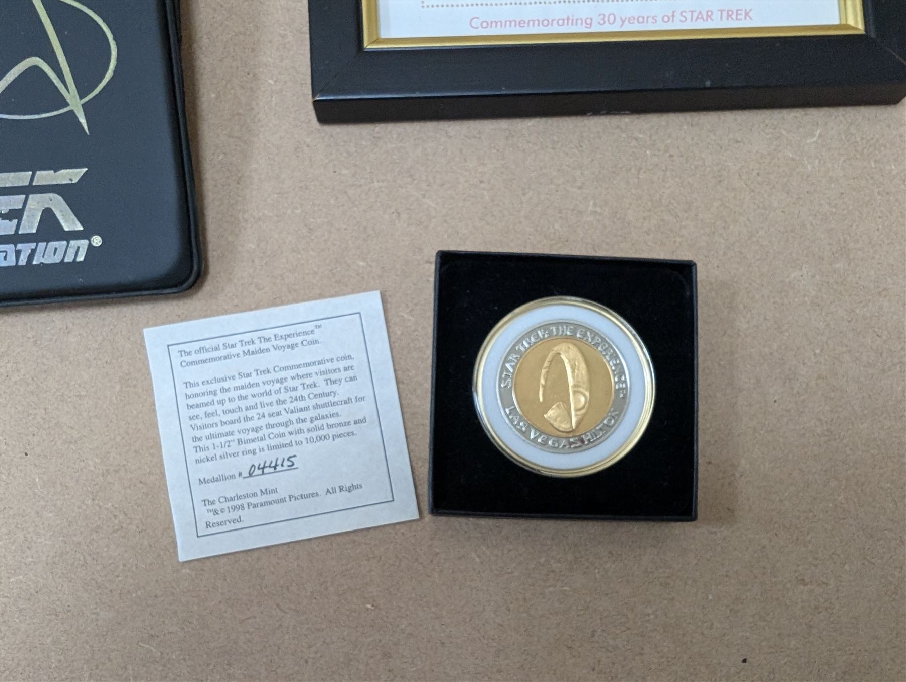 Star Trek collectables, including Danbury Mint '22ct Gold Card Collection', PCS Stamps and Coins Official US Postage Celebrating The Original Star Trek Series, Star Trek St Vincent and Grenadines first day cover collection, four stamp sets and a framed set of similar stamps, commemorative coins, Star Trek The Experience Las Vegas coin, three commemorative 'gold stamps' and three albums of collectors cards and telephone cards