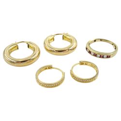 Gold diamond and garnet half eternity ring, pair of gold hoop earrings, both 9ct and a pair of silver-gilt cubic zirconia hoop earrings