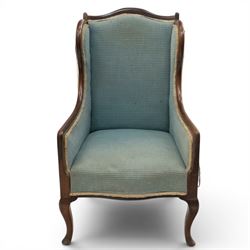 Edwardian armchair of squared form upholstered in blue fabric, serpentine seat front, shaped frame raised on cabriole supports