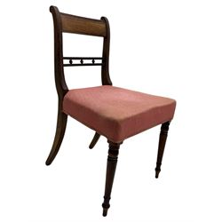 
Late Victorian mahogany extending dining table and four chairs, rectangular top with rounded corners and moulded edge, fitted with two additional leaves, raised on turned and reeded legs with brass castors, with a pair of Victorian mahogany hall chair, with curved top rail and plain splat, padded seat in textured salmon pink fabric, raised on turned and tapering front legs and another pair of early 20th century mahogany dining chair, with shield back and carved pierced splat, serpentine seat rail with striped upholstered cushion, raised on moulded square front legs