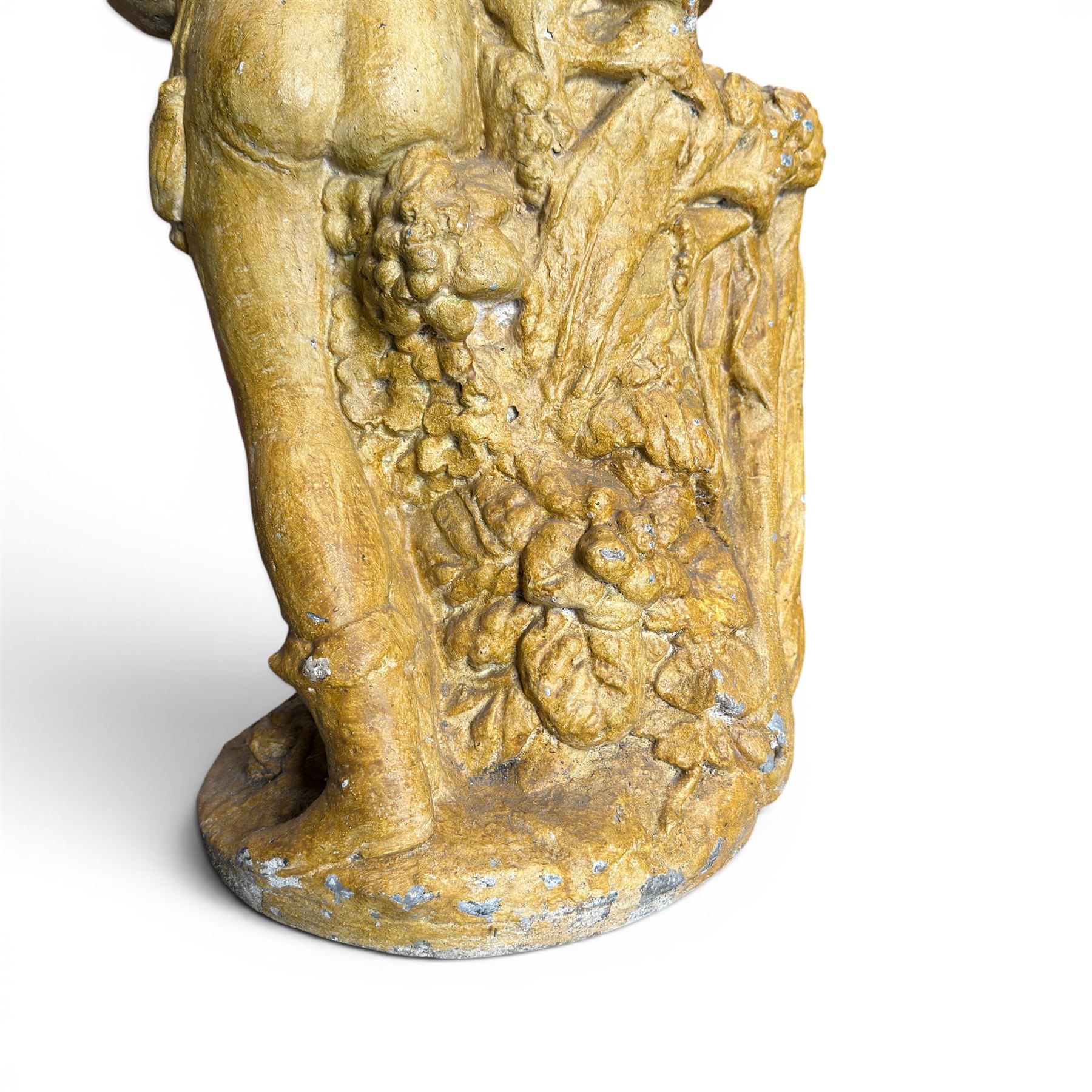 Composite garden statue group of Romeo and Juliet embracing in Medieval dress, surmounted on a naturalistic foliate base, in antique distressed glazed finish