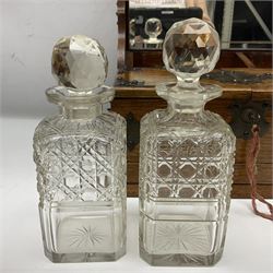 Victorian oak tantalus, mirrored high-back with recess for housing the decanters, behind a hinged box, with cribbage board to the concealed drawer below, marked Barman, London, H33cm, L37cm