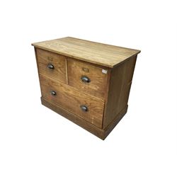 Early to mid-20th century oak chest, fitted with two short drawers over one long drawer, raised on plinth base